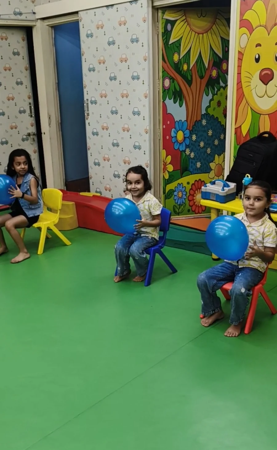 Children holding balls during a group activity