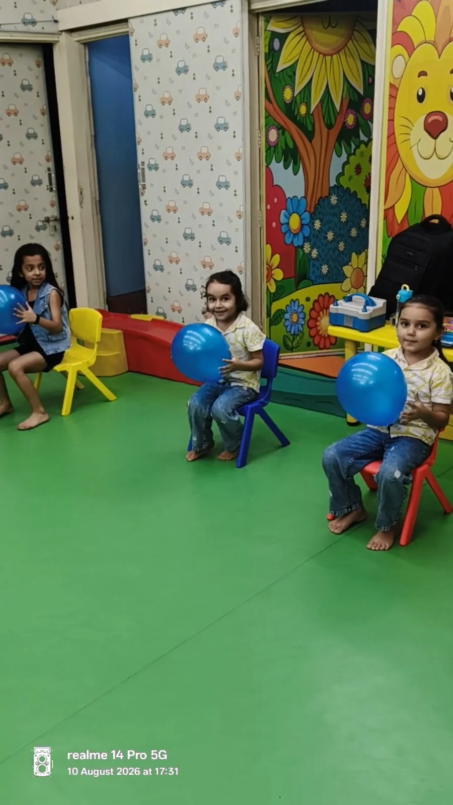 Children holding balls during a group activity