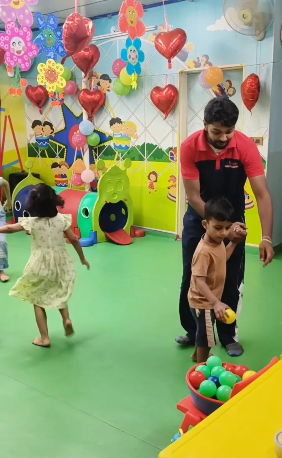 Children taking part in a guided ball activity